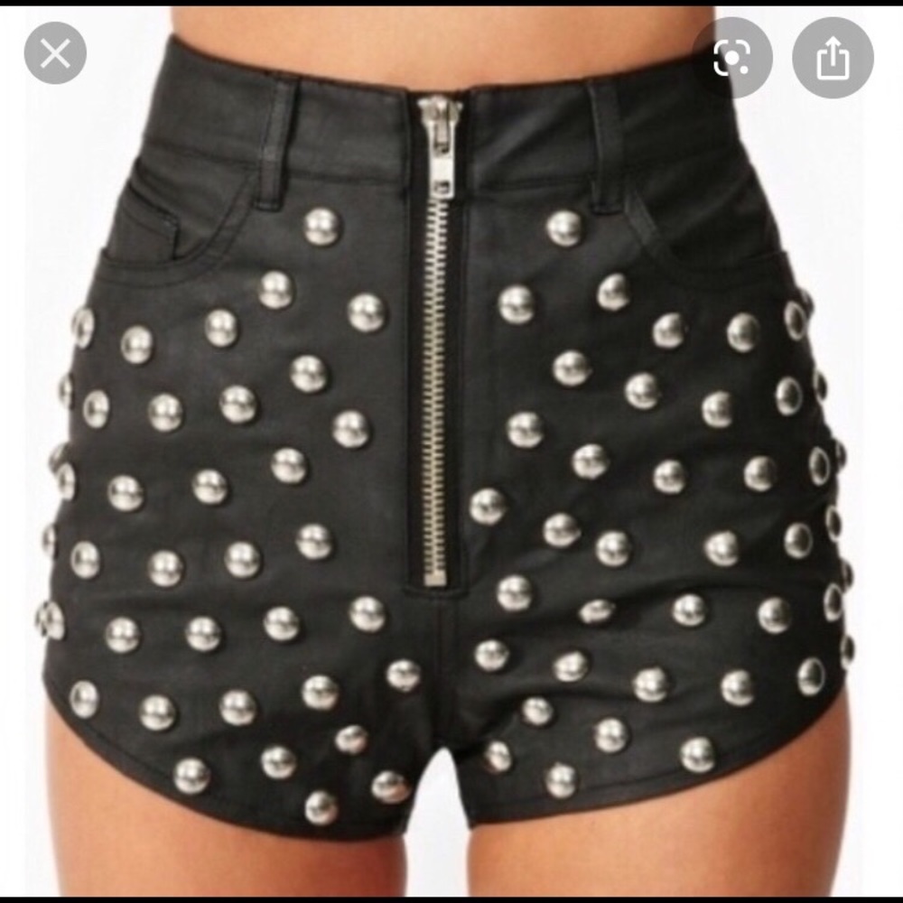 Unif high waisted faux leather shorts with studs